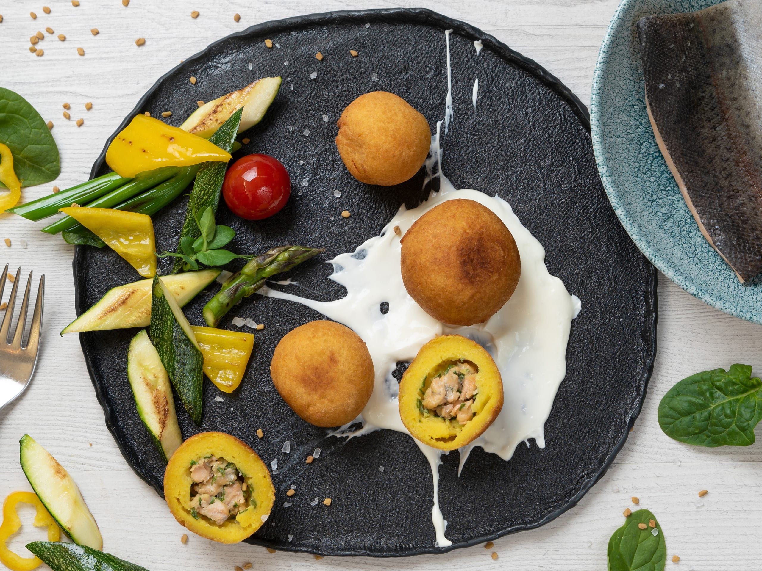 Gebackene Kartoffelknödel mit Lachsforelle